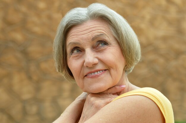 Portrait of a beautiful happy elderly woman