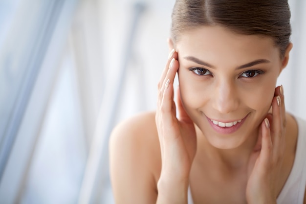 Portrait Beautiful Happy Woman With White Teeth Smiling