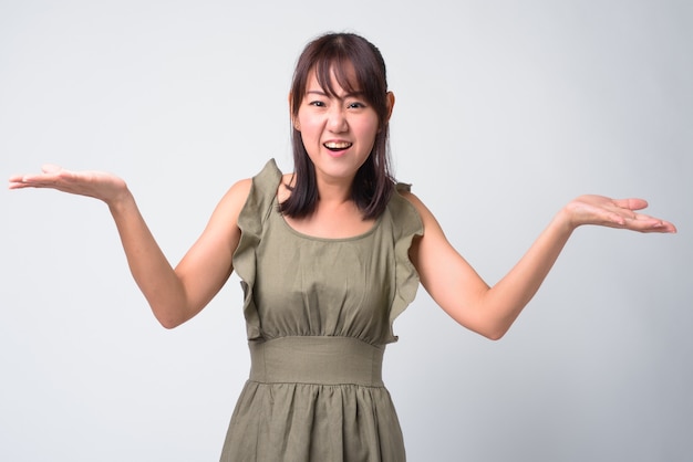 Portrait of beautiful Japanese woman on white