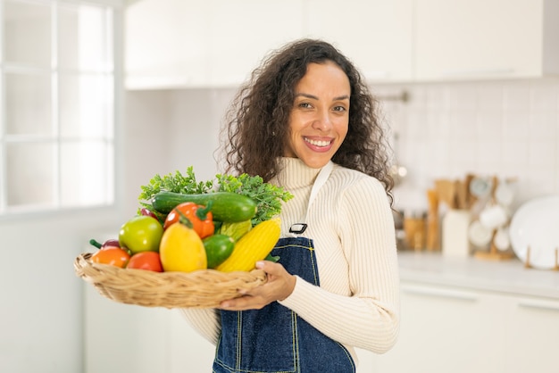 Portrait beautiful Latin woman in kitchen