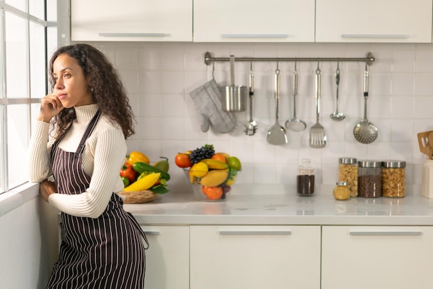 portrait beautiful Latin woman in kitchen