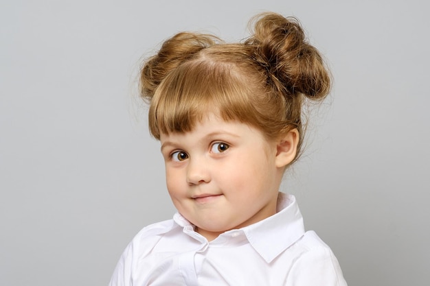 Portrait of beautiful little girl isolated