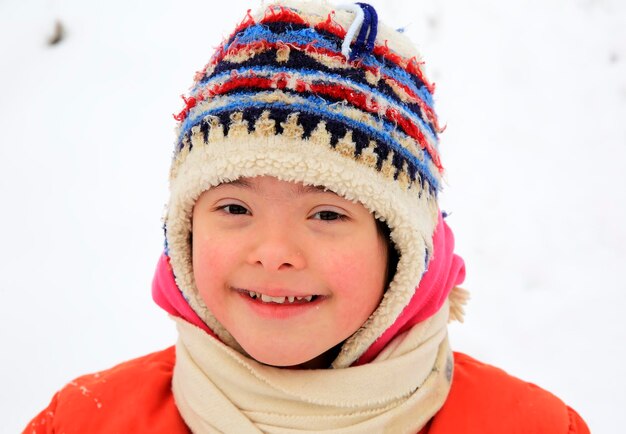 Portrait of beautiful little girl in the winter