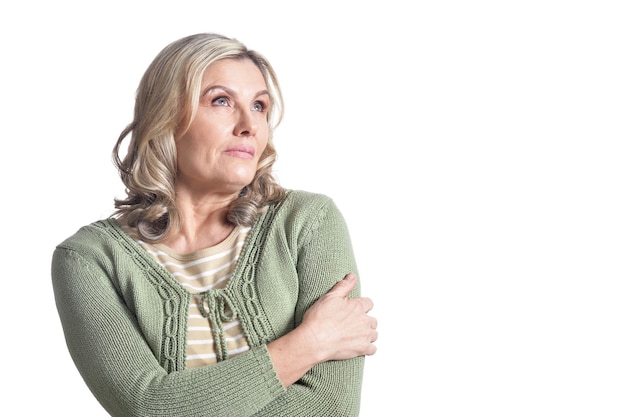 Portrait of beautiful mature woman posing isolated on white background