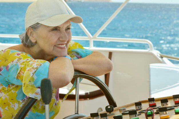 Portrait of a beautiful mature woman on yacht