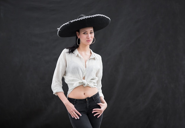 portrait of a beautiful Mexican girl in a sombrero