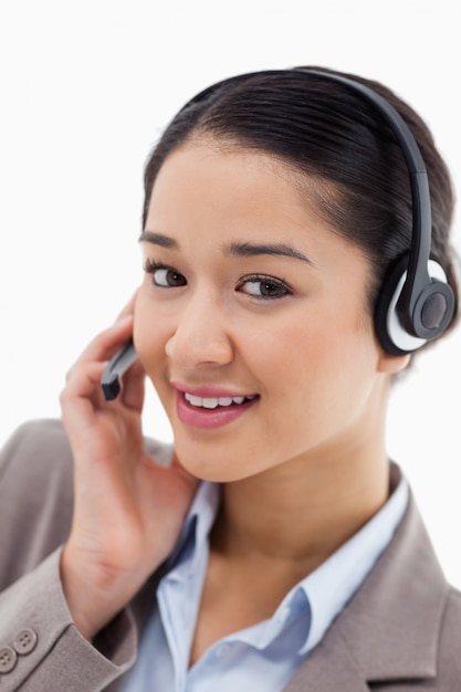 Portrait of a beautiful office worker posing with a headset