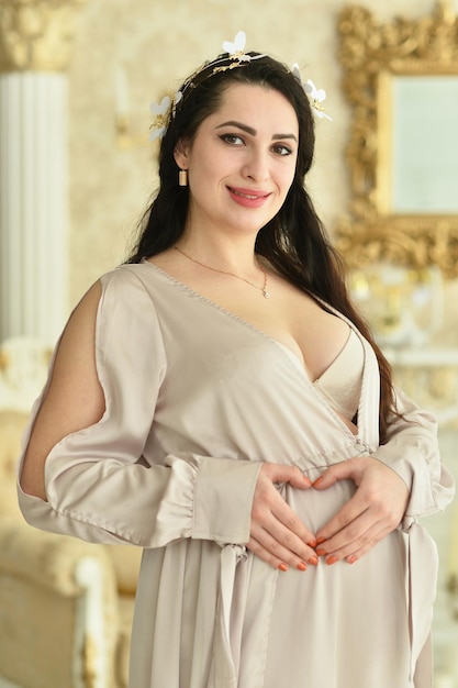 Portrait of a beautiful pregnant woman posing