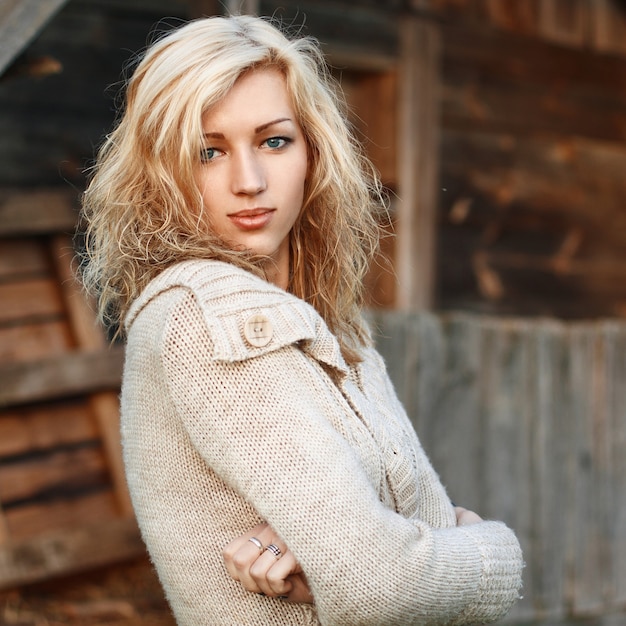 Portrait of a beautiful rural girl with blue eyes