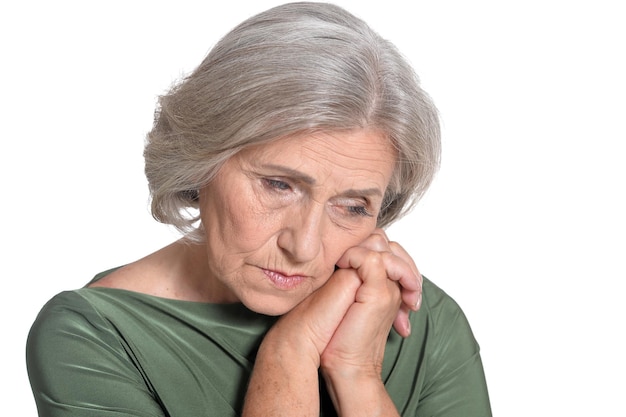 Portrait of a beautiful sad elderly woman close-up