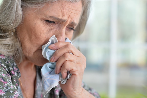 Portrait of a beautiful sad elderly woman