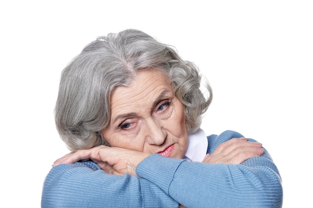 Portrait of beautiful sad senior woman posing