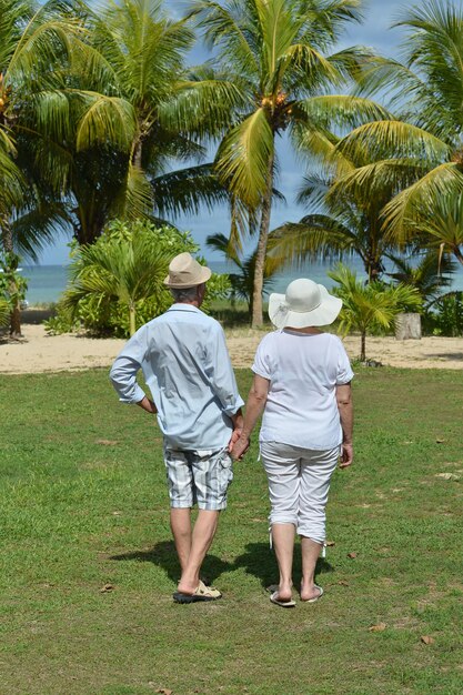 Portrait of beautiful senior couple resting at resort