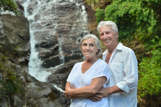 Portrait of beautiful senior couple resting at resort