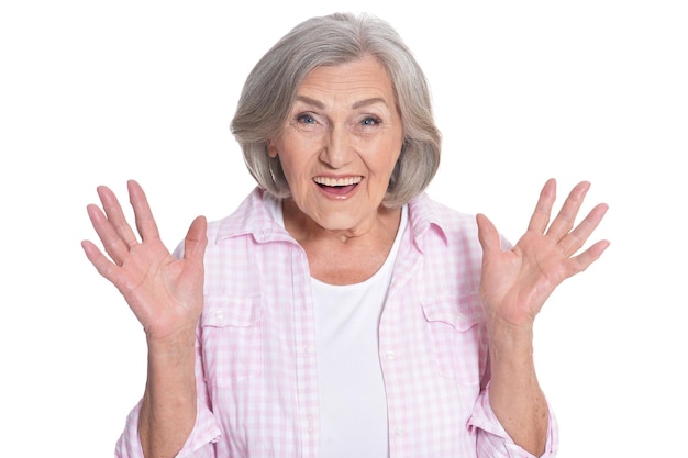 Portrait of beautiful senior woman posing isolated