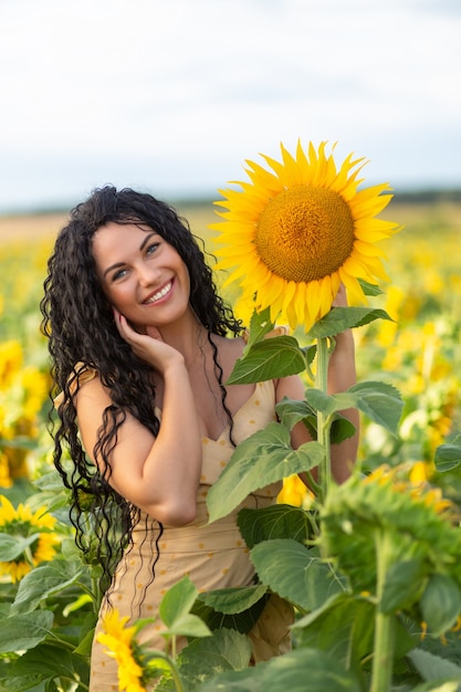 Portrait of a beautiful smiling dark-haired woman