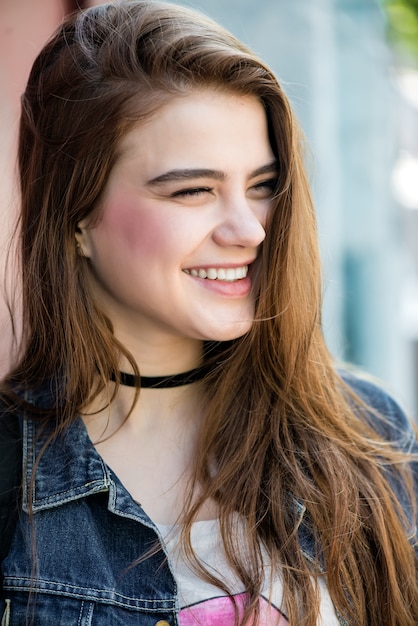 Portrait of a beautiful smiling modern girl