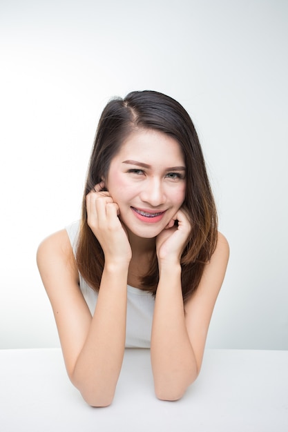 Portrait of a beautiful smiling young woman with natural make-up. Skincare, healthcare. 