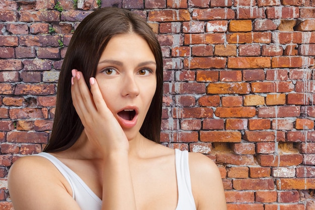 Portrait of beautiful surprised woman