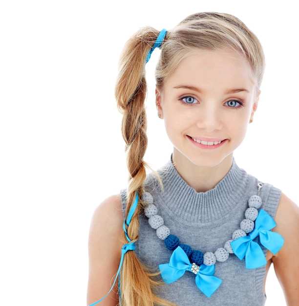 Photo portrait of a beautiful teenage girl on a white background