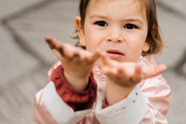 A portrait of a beautiful toddler