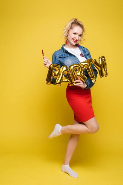 Portrait of beautiful woman celebrating a party and having fun