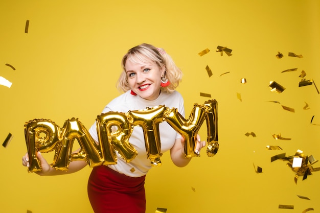 Portrait of beautiful woman celebrating a party and having fun