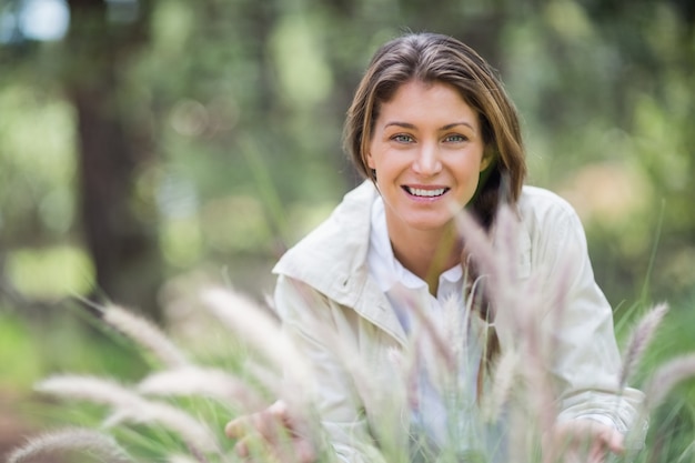 Portrait of beautiful woman crouching 