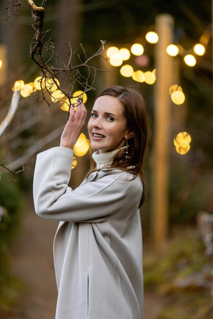 portrait of a beautiful woman on a frosty day First snow