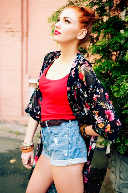 Portrait beautiful woman outdoor with red lips