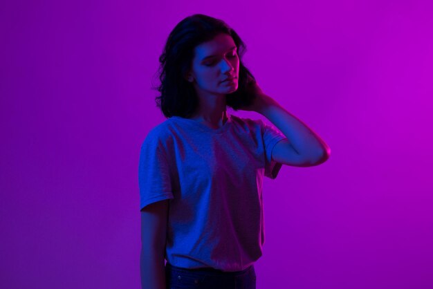 Portrait of beautiful woman Pink purple and blue light colors