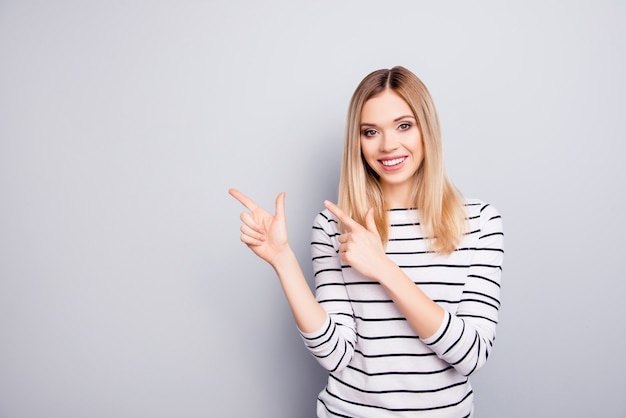 Portrait of beautiful woman pointing