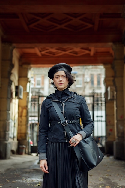 Portrait of beautiful woman posing on street