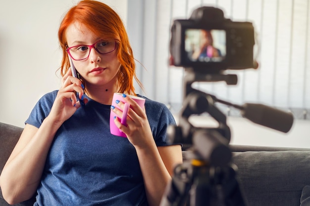 Portrait of beautiful woman sitting at home