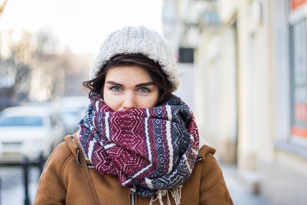Portrait of beautiful woman in snow