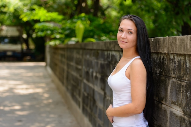 Portrait of beautiful woman in the streets outdoors