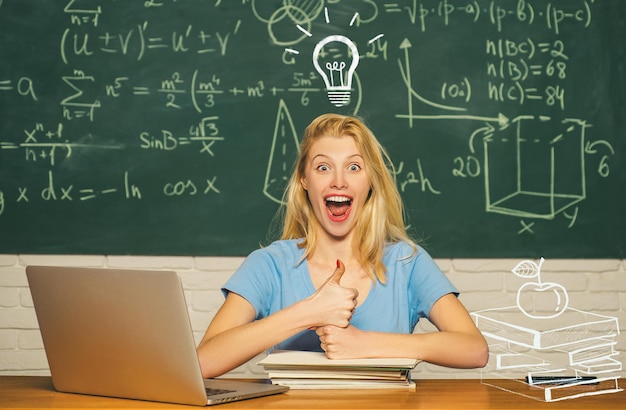 Portrait of a beautiful woman student happy mood smiling broadly in university female university stu...