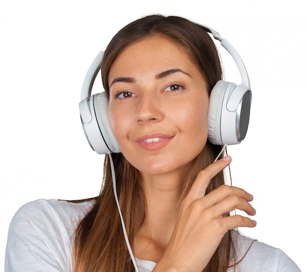 Portrait of a beautiful woman student  listening to music