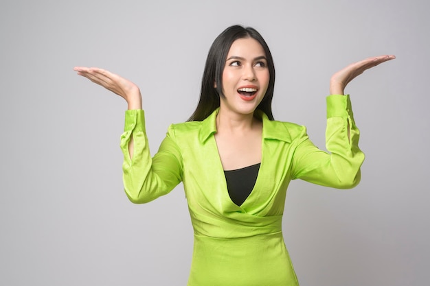 Portrait of beautiful woman over white background studio