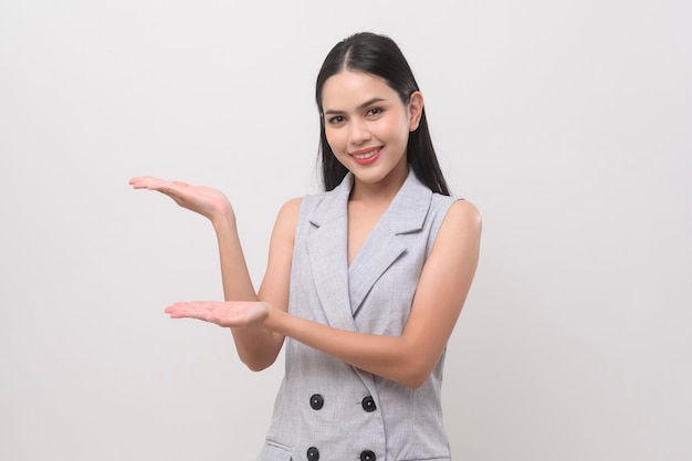 Portrait of beautiful woman over white background studio