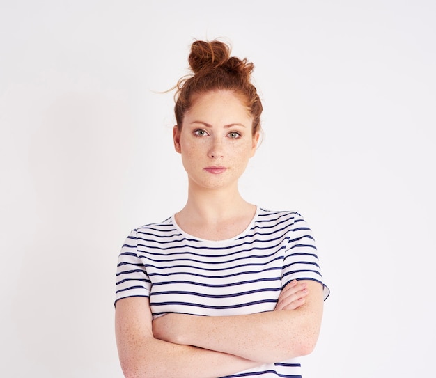 Portrait of beautiful woman with arms crossed  shot