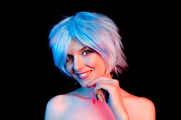 Portrait of beautiful woman with blue hair