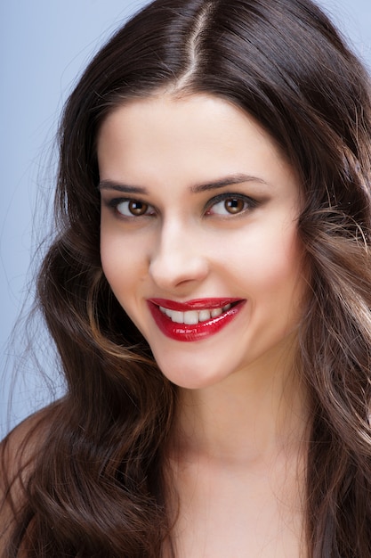 Portrait of beautiful woman with curly hairstyle