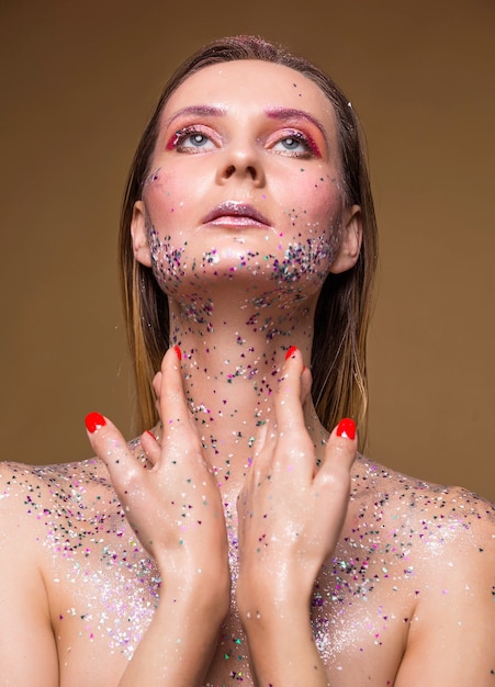 Portrait beautiful woman with glitter make up