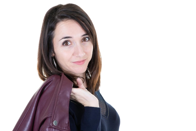 Portrait of a beautiful woman with her jacket on the shoulder with blank copyspace