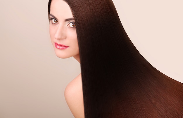 Portrait of Beautiful Woman with Long Hair.