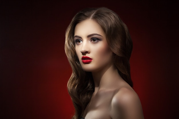 Portrait of beautiful woman with make-up and wavy hair