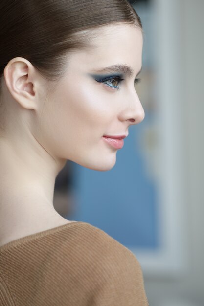 Portrait of beautiful woman with natural make up and hairstyle. Soft focus photo.