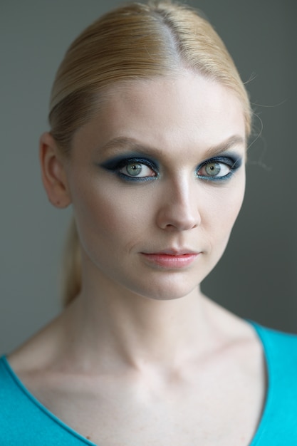 Portrait of beautiful woman with natural make up and hairstyle. Soft focus photo.