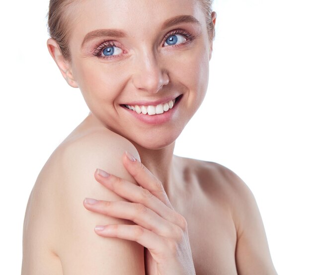 Portrait of beautiful woman with natural make up on white background